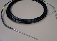 Stainless Steel Encased 10K Thermistor Probe pictured. Coiled cord leads to a thin pointy rod used to measure soil temperature